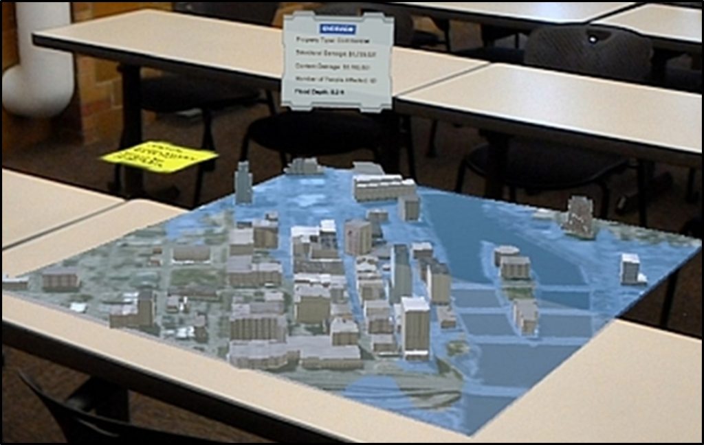 Image of a virtual model being displayed over a desk