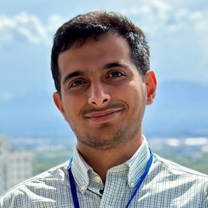 Portrait of Savalan Naser Neisary smiling outdoors